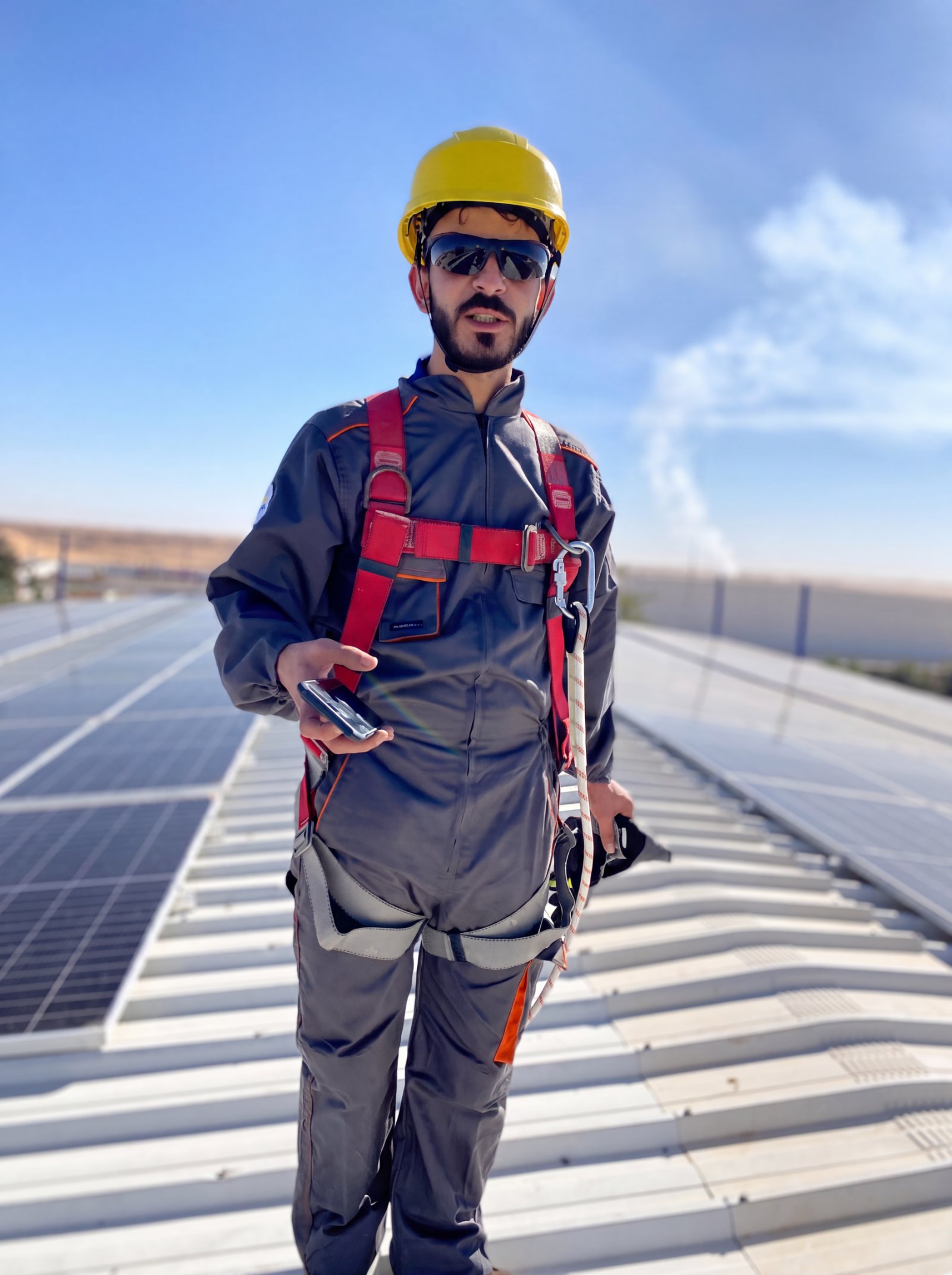 Site engineer on a rooftop photovoltaic plant