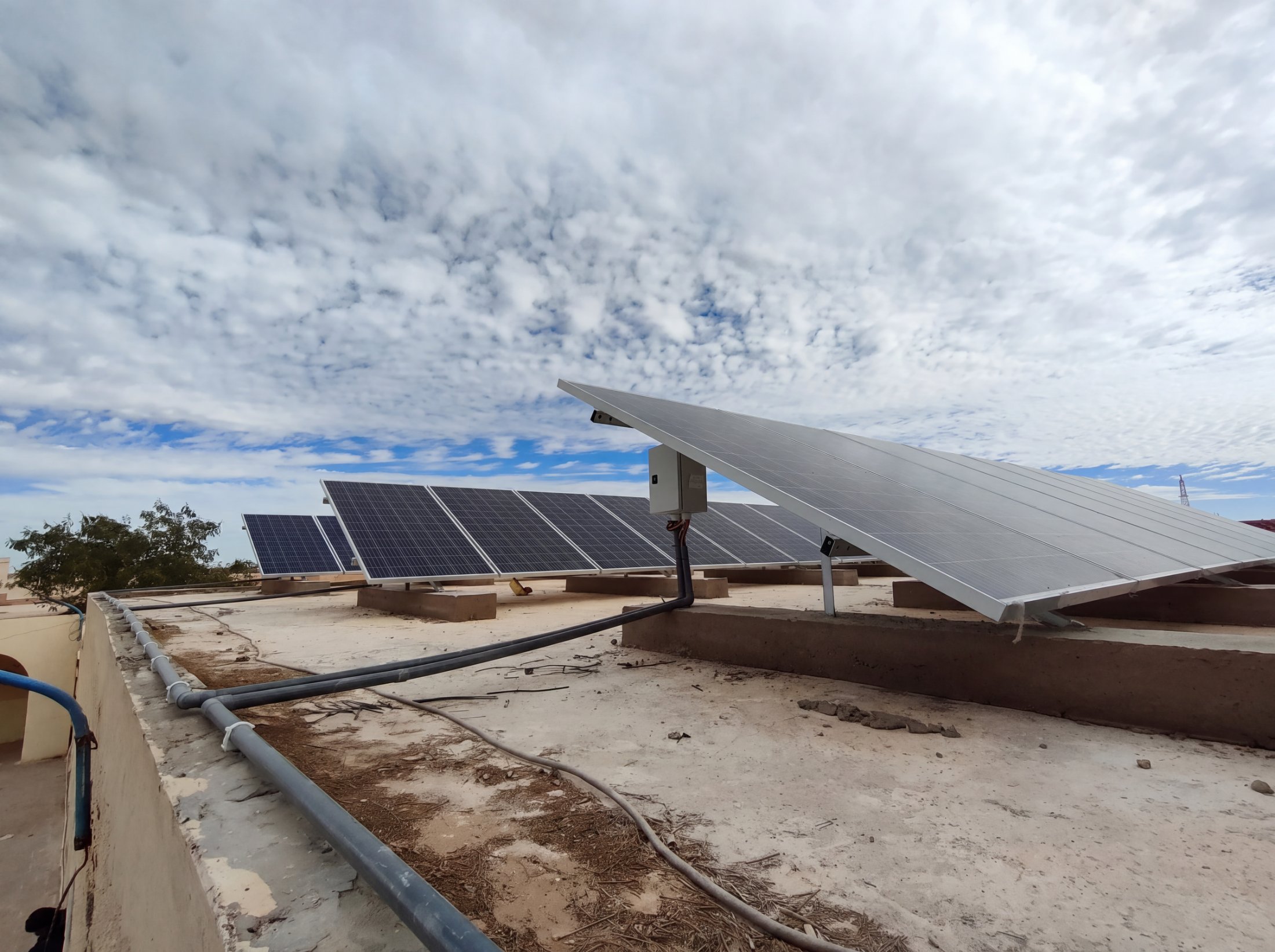 Ground-mounted solar panels at a school in Tindouf